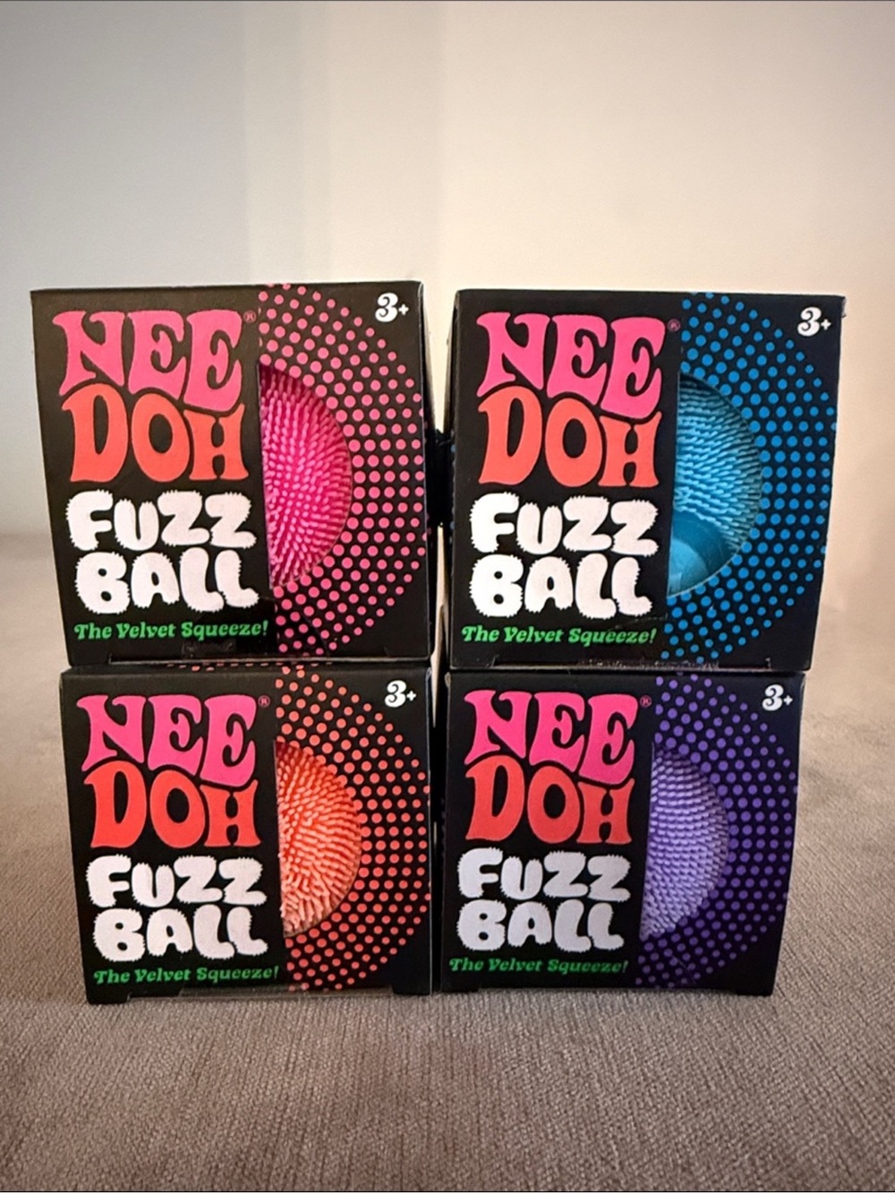 Needoh Fuzz Ball The Velvet Squeeze! Bundle Of 4 Pink, Purple, Blue, Orange